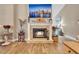 Cozy fireplace with decorative mantel and stone surround, creating a warm focal point in the living space at 1500 Wyngate Dr, Deland, FL 32724