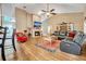 Spacious living room with vaulted ceilings, fireplace, and comfortable seating at 1500 Wyngate Dr, Deland, FL 32724