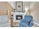 Living room showcasing fireplace with decorative accents and comfortable seating at 1500 Wyngate Dr, Deland, FL 32724