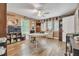 Bright home office with natural light, hardwood floors and ceiling fan at 1500 Wyngate Dr, Deland, FL 32724