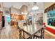 Open floor plan connecting kitchen, dining, and living areas, ideal for modern living and entertaining at 1500 Wyngate Dr, Deland, FL 32724