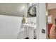 Classic powder room features wainscoting and a pedestal sink at 1500 Wyngate Dr, Deland, FL 32724