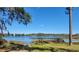 Beautiful waterfront property with lake access, clear skies, and a serene and peaceful view at 165 Franklin Rd, Lake Mary, FL 32746