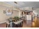 Open concept dining room with pendant lighting, bar seating, and direct access to the kitchen at 1900 N Atlantic Ave # 1603, Daytona Beach, FL 32118