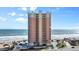 Stunning beachfront condo building with multiple floors and private balconies at 1900 N Atlantic Ave # 1603, Daytona Beach, FL 32118