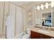 Cozy bathroom with a shower, granite vanity, and stylish decor at 1925 S Atlantic Ave # 201, Daytona Beach, FL 32118