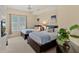 Inviting bedroom with twin beds, soft blue accents, and modern furniture at 1925 S Atlantic Ave # 201, Daytona Beach, FL 32118