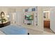 Serene bedroom features a built-in TV, and ensuite bathroom, enhancing relaxation at 1925 S Atlantic Ave # 201, Daytona Beach, FL 32118