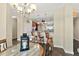 Inviting dining area with a view of the open kitchen and bar seating at 1925 S Atlantic Ave # 201, Daytona Beach, FL 32118