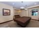 Features a pool table and sitting area with natural lighting at 1925 S Atlantic Ave # 201, Daytona Beach, FL 32118