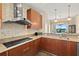 Well-equipped kitchen with modern appliances, granite countertops and an island at 1925 S Atlantic Ave # 201, Daytona Beach, FL 32118