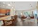 Open concept floor plan with bar seating, dining and living area with ocean views at 1925 S Atlantic Ave # 201, Daytona Beach, FL 32118