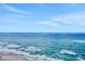 Breathtaking ocean view with blue water and a sandy beach in the distance at 1925 S Atlantic Ave # 201, Daytona Beach, FL 32118