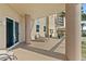 Take in the amazing view from this covered seating area off the main living space at 1925 S Atlantic Ave # 201, Daytona Beach, FL 32118