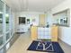 Bright reception area with a modern desk, tiled floors, and natural light creating a welcoming space at 1925 S Atlantic Ave # 201, Daytona Beach, FL 32118