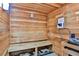 Private residential sauna with a wooden bench at 1925 S Atlantic Ave # 201, Daytona Beach, FL 32118