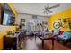 Eclectic room, possible bedroom, with yellow walls and laminate flooring at 1978 S Old Mill Dr, Deltona, FL 32725