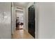 Hallway featuring neutral paint and tile floors at 1978 S Old Mill Dr, Deltona, FL 32725