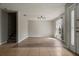Open-concept living room featuring hardwood floors and natural light at 1978 S Old Mill Dr, Deltona, FL 32725