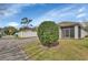 A view of the back yard with a screened in lanai at 203 W Tarrington Dr, Deland, FL 32724