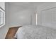 Bright bedroom featuring a closet, with all-white trim and light-colored walls at 203 W Tarrington Dr, Deland, FL 32724