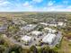 Aerial view of commercial real estate with ample parking, ideally located near residential areas at 203 W Tarrington Dr, Deland, FL 32724