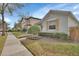 Charming single-story home with well-maintained landscaping and shuttered windows at 203 W Tarrington Dr, Deland, FL 32724