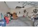 Garage space with concrete floor, tools, storage, and vehicle at 203 W Tarrington Dr, Deland, FL 32724