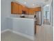Contemporary kitchen with stainless steel appliances and a breakfast bar at 214 Woodhouse Ln, Deland, FL 32724