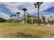Attractive retail center with storefronts, outdoor seating, and palm trees, enhancing the community's commercial appeal at 214 Woodhouse Ln, Deland, FL 32724