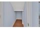 Cozy storage space with wood-look flooring perfect for organizing household items at 214 Woodhouse Ln, Deland, FL 32724