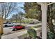 Street view of a neighborhood showcasing lush greenery, mature trees, and well-maintained landscaping at 214 Woodhouse Ln, Deland, FL 32724