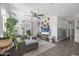 Cozy living room with a large window, modern decor, and comfortable seating at 2216 Umbrella Tree Dr, Edgewater, FL 32141