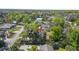 Aerial view of property with lush trees and neighborhood around at 2249 Swoope Dr, New Smyrna Beach, FL 32168