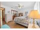 Well-lit bedroom with closet, dresser, and a comfortable bed at 2249 Swoope Dr, New Smyrna Beach, FL 32168