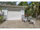 Attached garage offers ample parking space, plus an outdoor patio area for relaxing at 2249 Swoope Dr, New Smyrna Beach, FL 32168