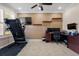 Functional home office with a ceiling fan, built in shelving, and ample workspace at 2344 Kelbrook Ct, Oviedo, FL 32765