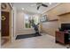 Functional home office with a ceiling fan, built in shelving, and ample workspace at 2344 Kelbrook Ct, Oviedo, FL 32765