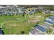 Aerial view of community featuring green space, walking trails and residential homes at 2393 Oxmoor Dr, Deland, FL 32724