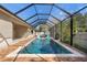 The outdoor pool has a brick deck with a screened-in lanai at 2393 Oxmoor Dr, Deland, FL 32724