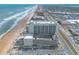 An aerial showcasing the hotel and the parking garage close to the beach at 2700 N Atlantic Ave # 454, Daytona Beach, FL 32118