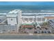 A scenic aerial view captures the beachfront hotel, showcasing its proximity to the ocean and ample parking at 2700 N Atlantic Ave # 454, Daytona Beach, FL 32118