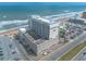 An elevated view shows the resort with a parking garage and beach access at 2700 N Atlantic Ave # 454, Daytona Beach, FL 32118