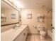 Bright bathroom with vanity, toilet, and tiled shower/bath combo at 2700 N Atlantic Ave # 454, Daytona Beach, FL 32118