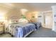 Cozy bedroom with two beds, nautical decor, and a glimpse of the entryway at 2700 N Atlantic Ave # 454, Daytona Beach, FL 32118