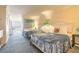 Comfortable bedroom with two queen beds and a view of the ocean from the balcony at 2700 N Atlantic Ave # 454, Daytona Beach, FL 32118