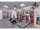Modern fitness center with treadmills, elliptical machines, and plenty of natural light for an invigorating workout at 2700 N Atlantic Ave # 454, Daytona Beach, FL 32118