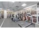 A well-lit fitness center features modern cardio equipment and mirrored walls for a complete workout experience at 2700 N Atlantic Ave # 454, Daytona Beach, FL 32118
