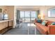 Bright living room with ocean views, dining area, and comfortable seating at 2700 N Atlantic Ave # 454, Daytona Beach, FL 32118