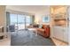 Cozy living room with ocean view, dining table, and access to modern kitchen at 2700 N Atlantic Ave # 454, Daytona Beach, FL 32118